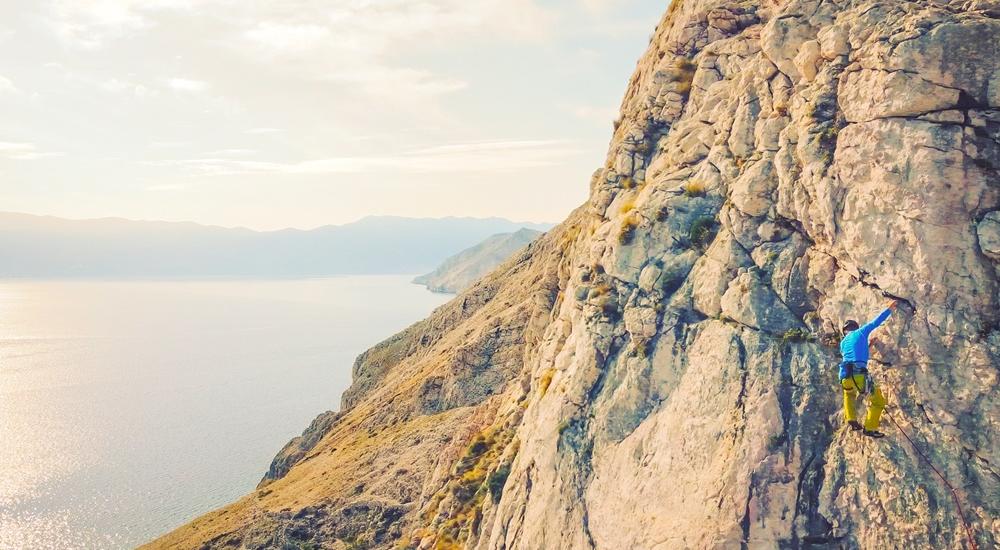 Free rock climbing above the Baška